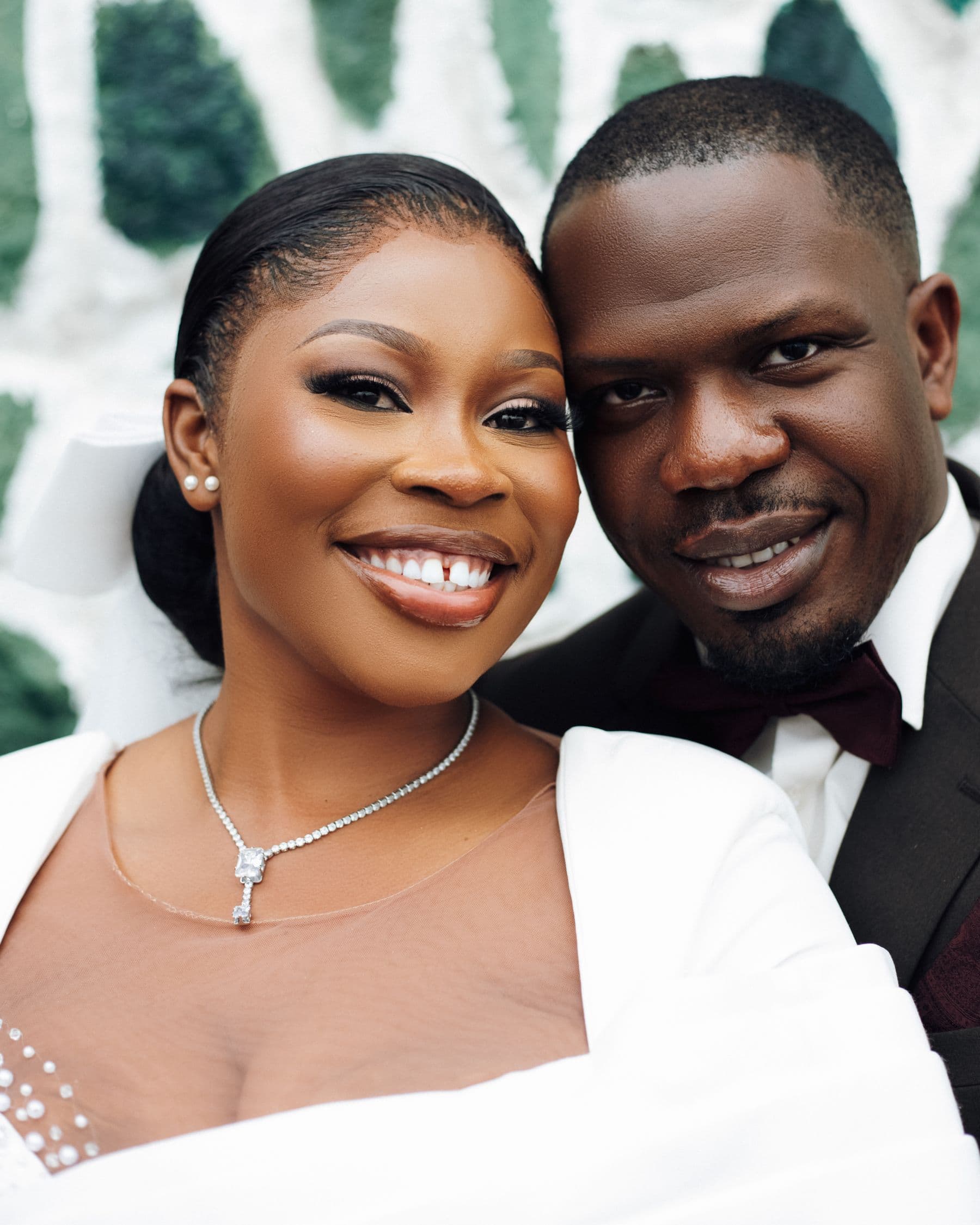 Elegant African newlyweds smiling together